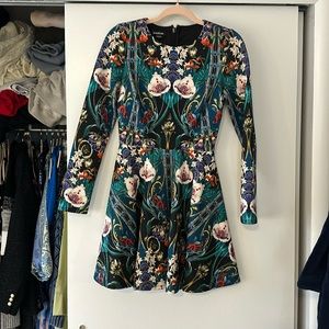 Beautiful Bebe dress. Quilted fit and flare. Wore to a wedding. Xs.